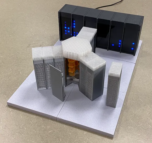 RasQberry Two — a 3D-printed model of IBM Quantum System Two with glowing LEDs