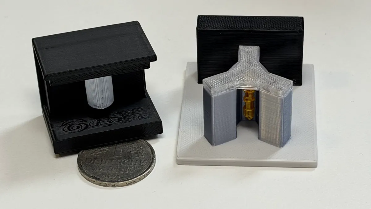 Qutie One and Qutie Two — palm-sized 3D-printed quantum computer models